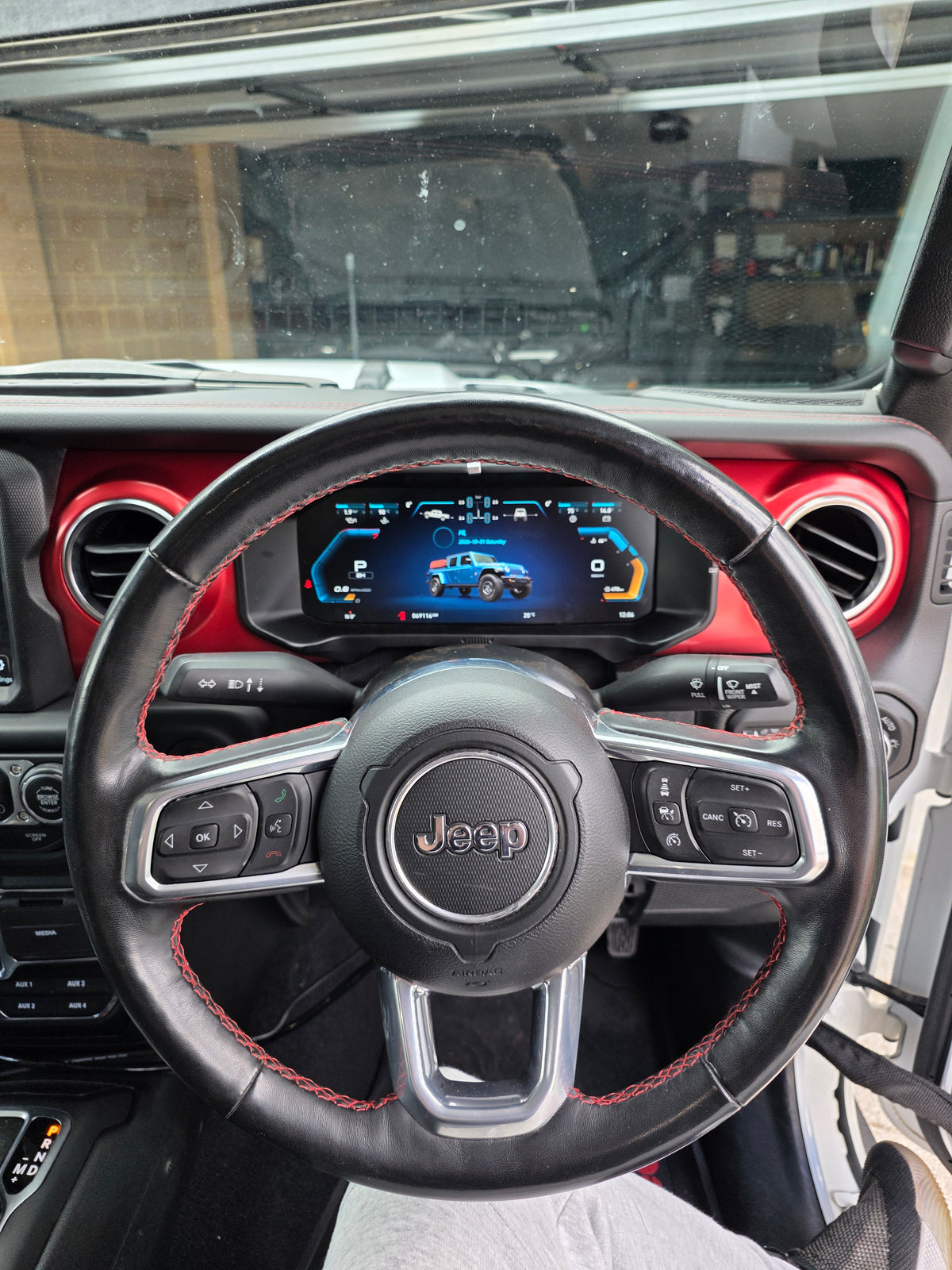 J-Plus digital dash fitted in a Jeep Gladiator with the red trim panel