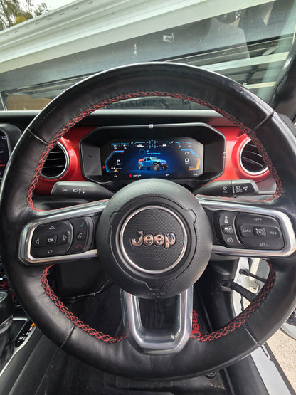 J-Plus digital dash behind the steering wheel